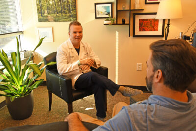 Dr. Martin counseling a young male